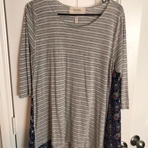 Grey and white strip top with fun detail